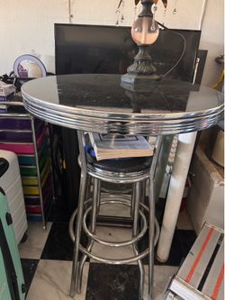 2 barstool and table
