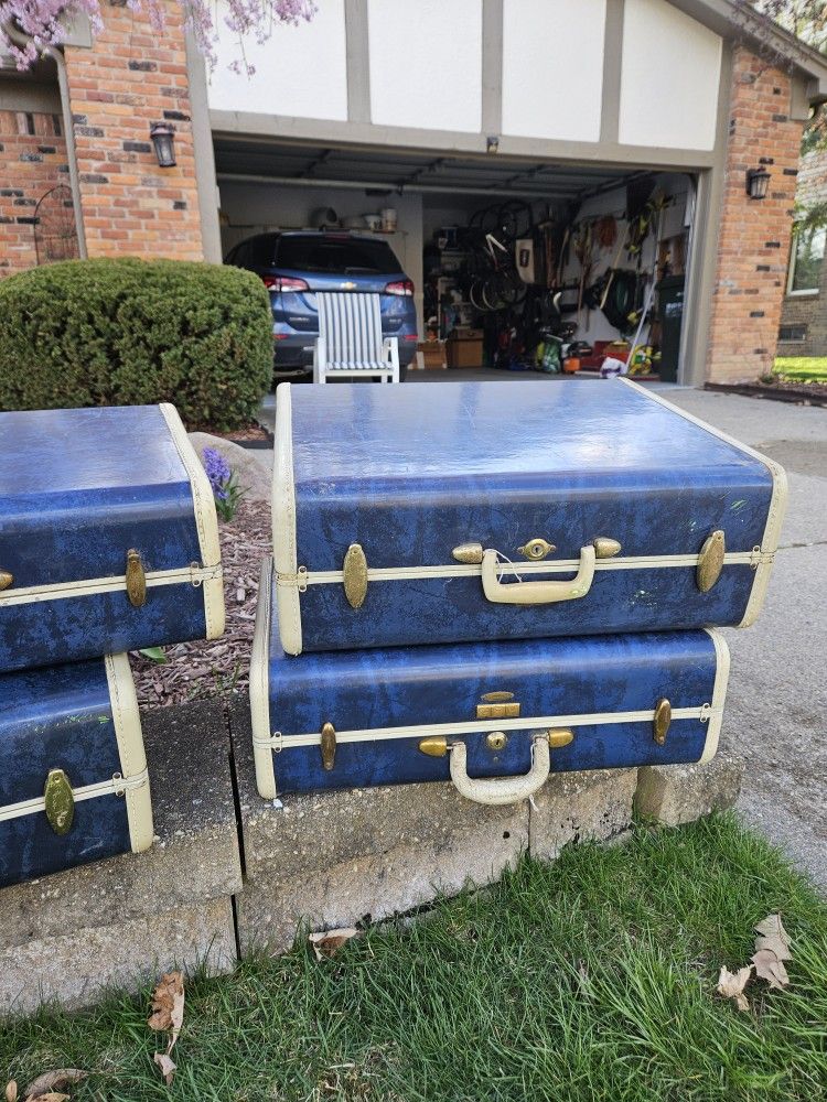 4 Vintage Blue Suitcases