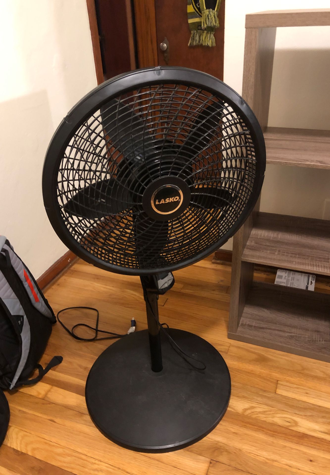 Adjustable, oscillating fan