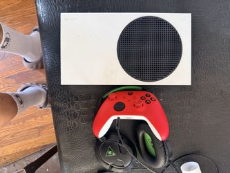 Xbox with controller and headphones