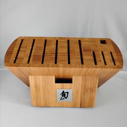 Shun ken kitchen knife block holder 11slot pre-owned great condition selling as is$200 plus shipping and handling