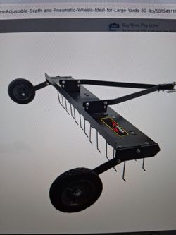 Brinly 48 inch tow behind dethactcher