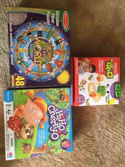 Three assorted game board boxes