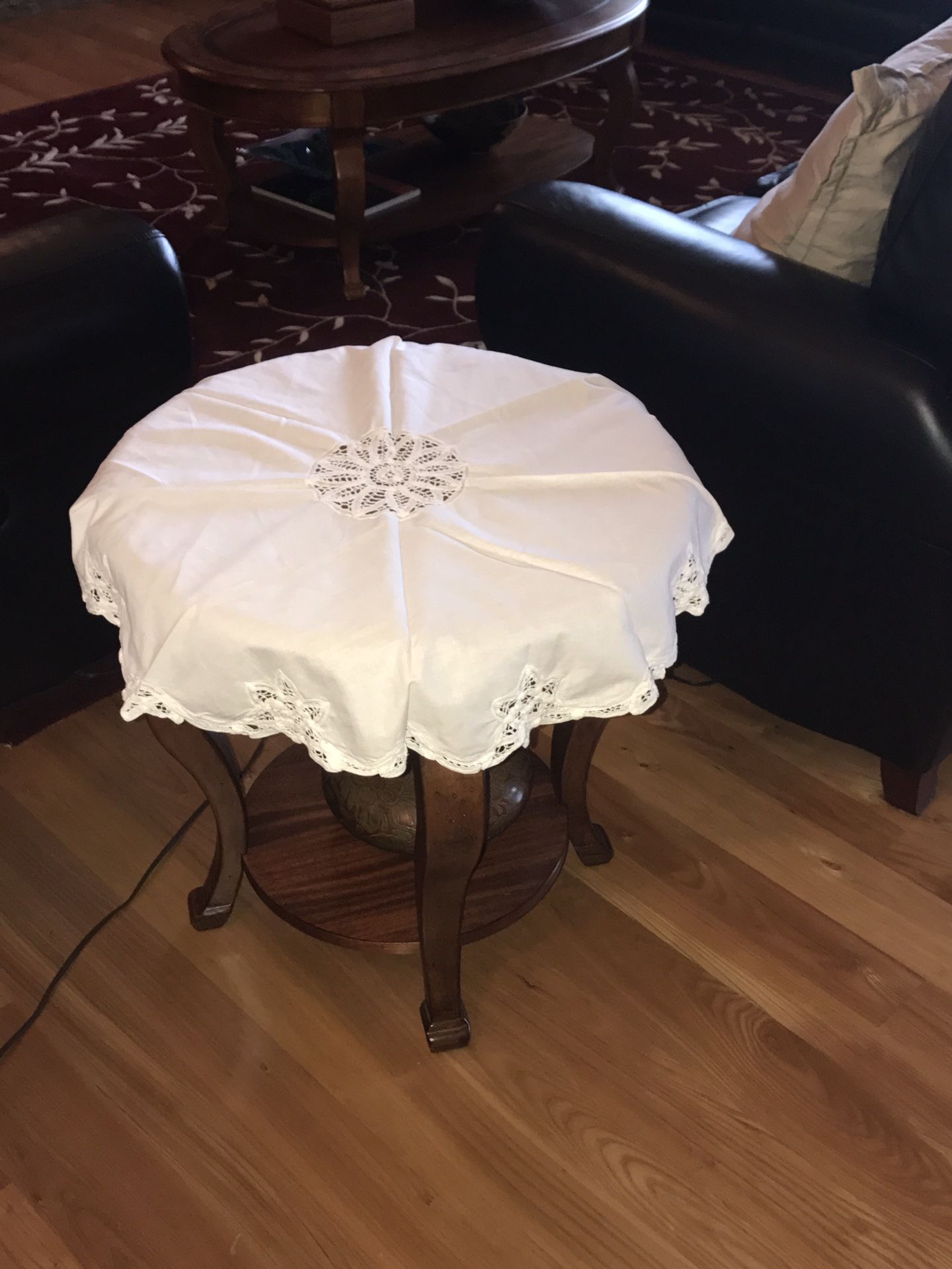 Antique Table Covering With beautifully cutout designs around the edges white round