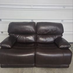 1- Dual Leather Power Recliner Sofa. Used, in very good condition. 

