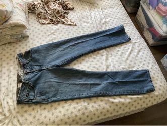 Men's  size  32  jeans  -  $5  each