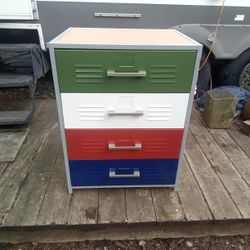 Sturdy Metal 4 Drawer Cabinet, 32" Tall, 24" Wide, 19" Deep, Great Condition. $40.00.