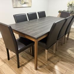 Dinning room table with 8 chairs