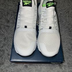 Size 10.5, men’s brand new unworn Reebok shoes with tags and box