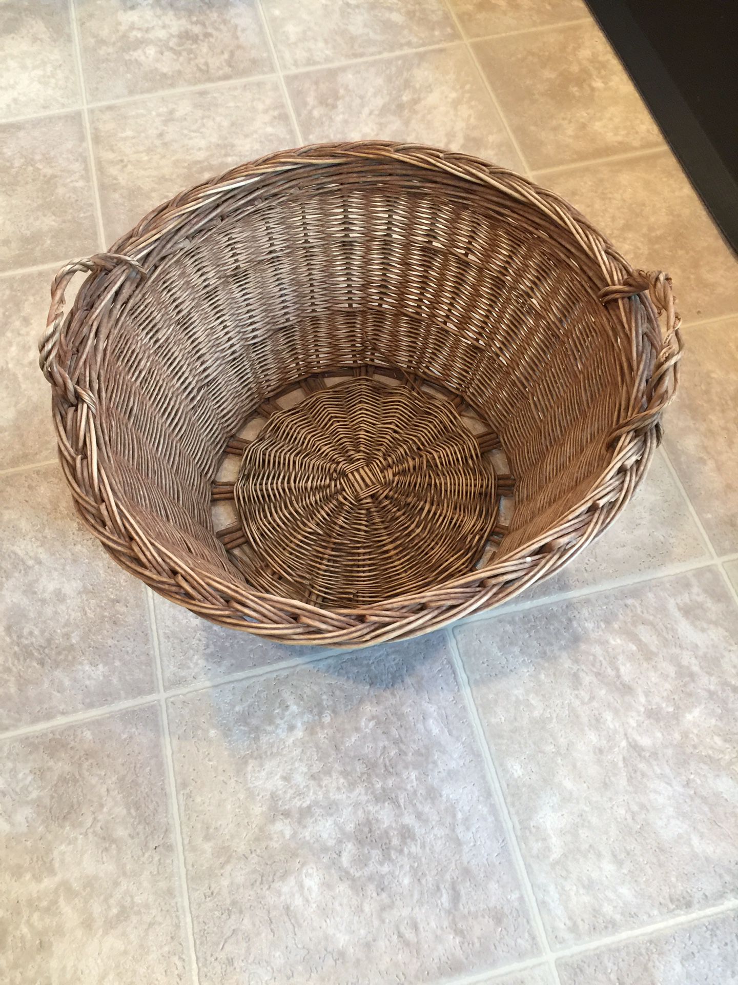 Antique wicker laundry basket.