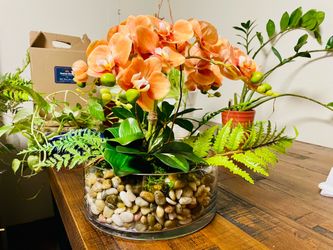 Fake Orchid Arrangement. Artificial flowers.