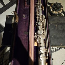 1925 Beuscher Alto Saxophone And A Soprano Sax