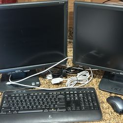 Computer, monitors keyboard and mouse