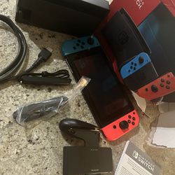 NINTENDO SWITCH  With ACCESSORIES IN PICTURE