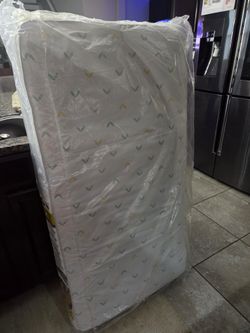Sleepy Little One crib and toddler mattress