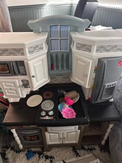 Toy kitchen and goodies