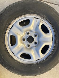 One rim wheel of 05 Toyota Tacoma and 205 70 15 good condition  5x114  or 4.5 one only good for spare