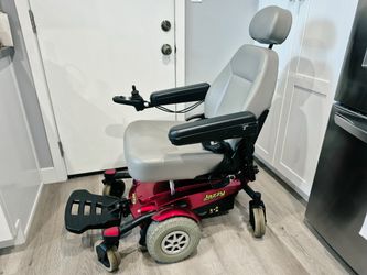 Motorized wheelchair scooter