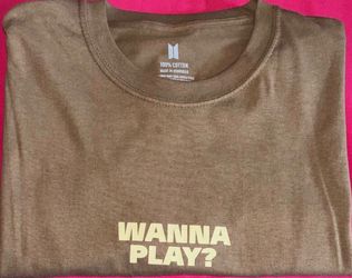 Hope On The Stage" tour merchandise featuring the phrase "Wanna Play?".