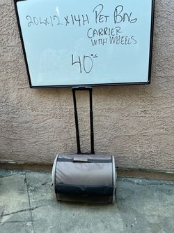 Pet carrier roller