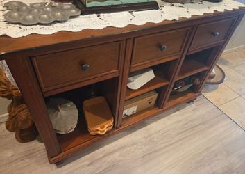 Dark brown wood console table
