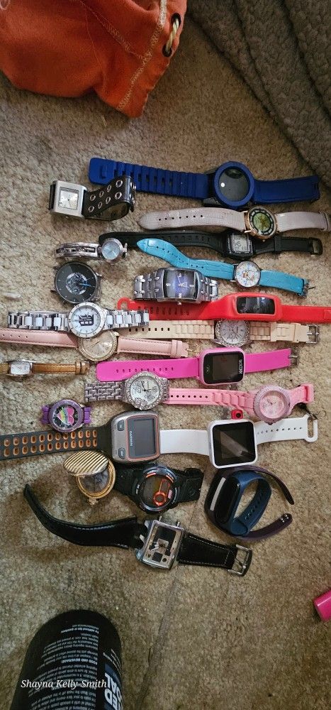 Bunch Of Watchs Including Fitbits