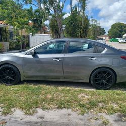 Looking To Trade My 20inch Rim & Tires With Smaller Size