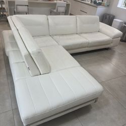 Sofa with reclining backrest