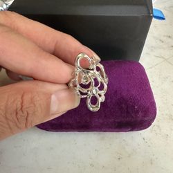 925 Sterling silver elongated diamond cut swirl design ring , size 6.75 , marked 925 w/ symbol