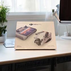 6558798 DJI mini 4 pro drone and RC 2 built in screen Floor Model 