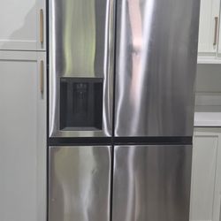 Fridge micro wave and granite counter top
