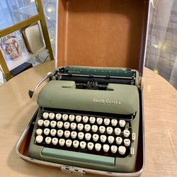 Vintage 1950s Smith Corona silent-super typewriter and case —Visit EN Miller Antique Mall in Verona 