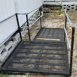 Wheelchair Ramp And Landing With Railings