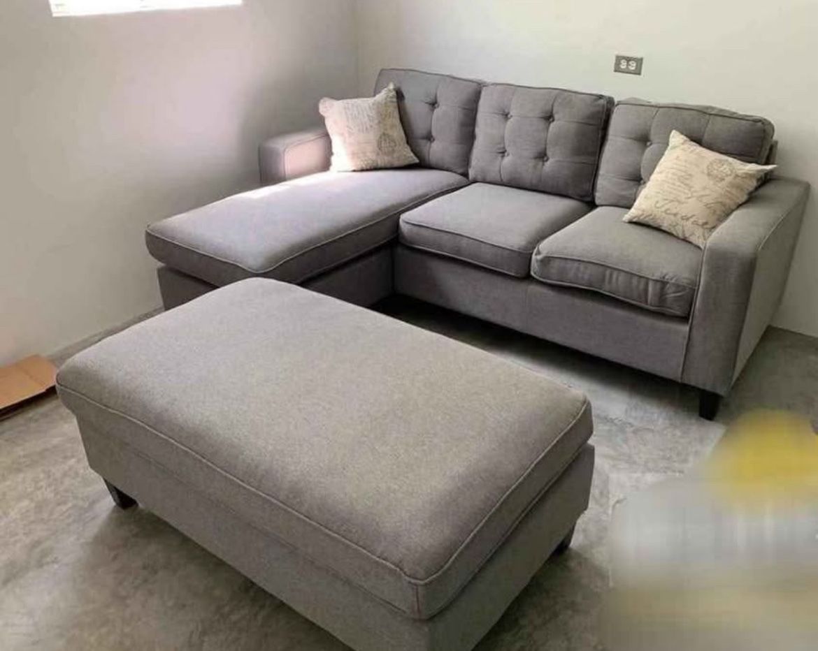 Like new light grey linen Sectional Sofa with Ottoman and 2 accent pillows.
