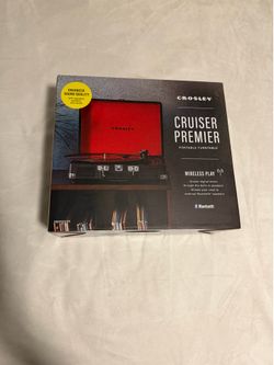 Brand new in box. Bluetooth connectivity, built-in speakers, and 3-speed vinyl playback.