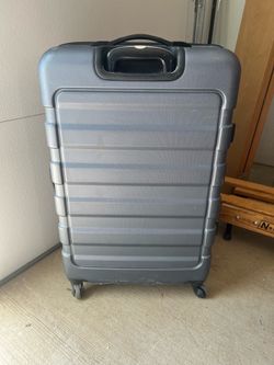 TAG hardside spinner suitcase