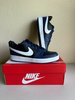 Black, white, blue Nikes