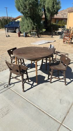 Antique turn-of-the-century game table and chair chairs