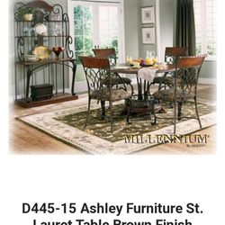 Dinning oom table with four chairs. Ashley Furniture.  ST. Lauret Brown Finish.