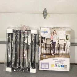 56-74” Regalo gate (new )- 28” height 
