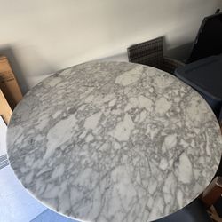 Round Marble Table + Four Black Chairs
