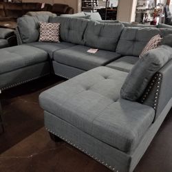 Gray sectional with pinheads