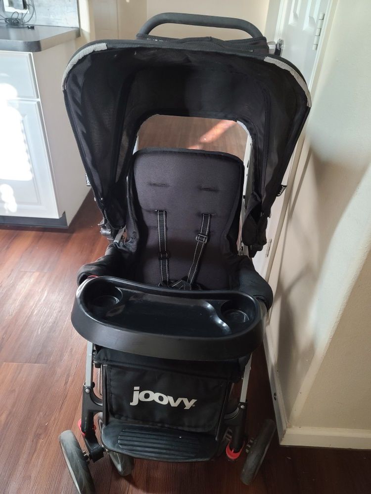 Sit and stand doble joovy stroller