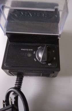 Malibu low voltage landscape lighting transformer with a photocell sensor and timer