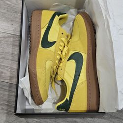 Nike Field General Sneakers in Chrome Yellow, Fir, Gum, & Med Brown
Nike M 9.5 W 11