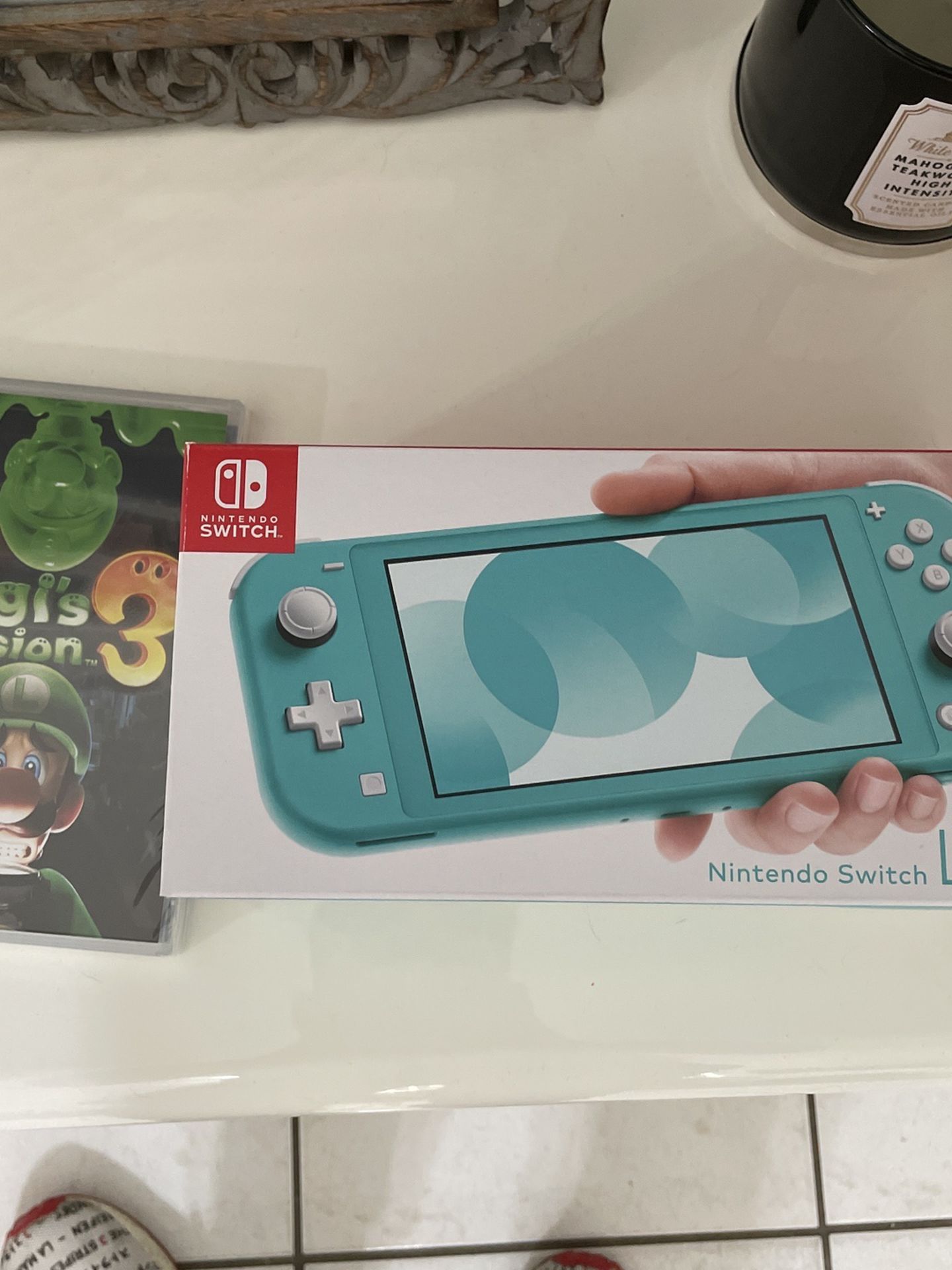 Nintendo Switch Lite Handheld Console Turquoise + Luigi Mansion + Switch Case