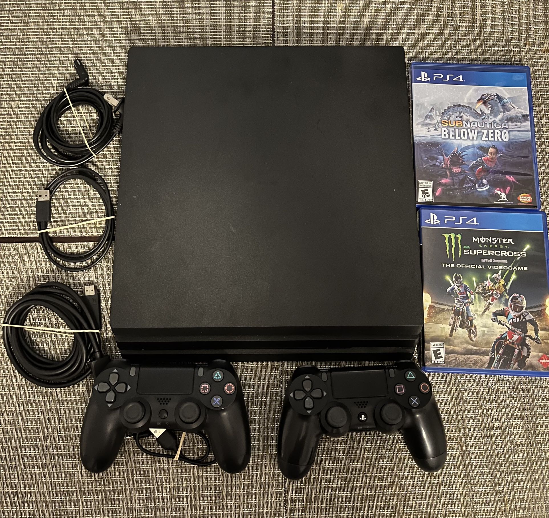 PS4 Pro With 2 Controllers And 2 Games