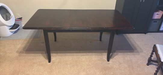 Dining table with built in leaf