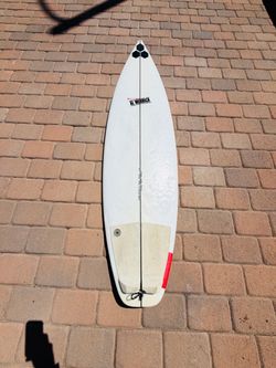 Two happy Channel Islands surfboard Shortboard 5’11