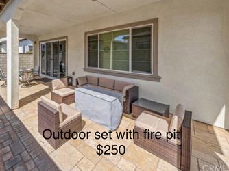 Wicker outdoor set with fire pit